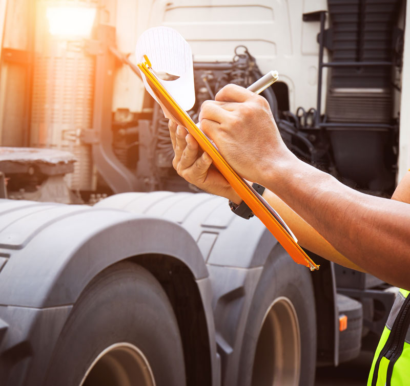Mechanic inspecting lights