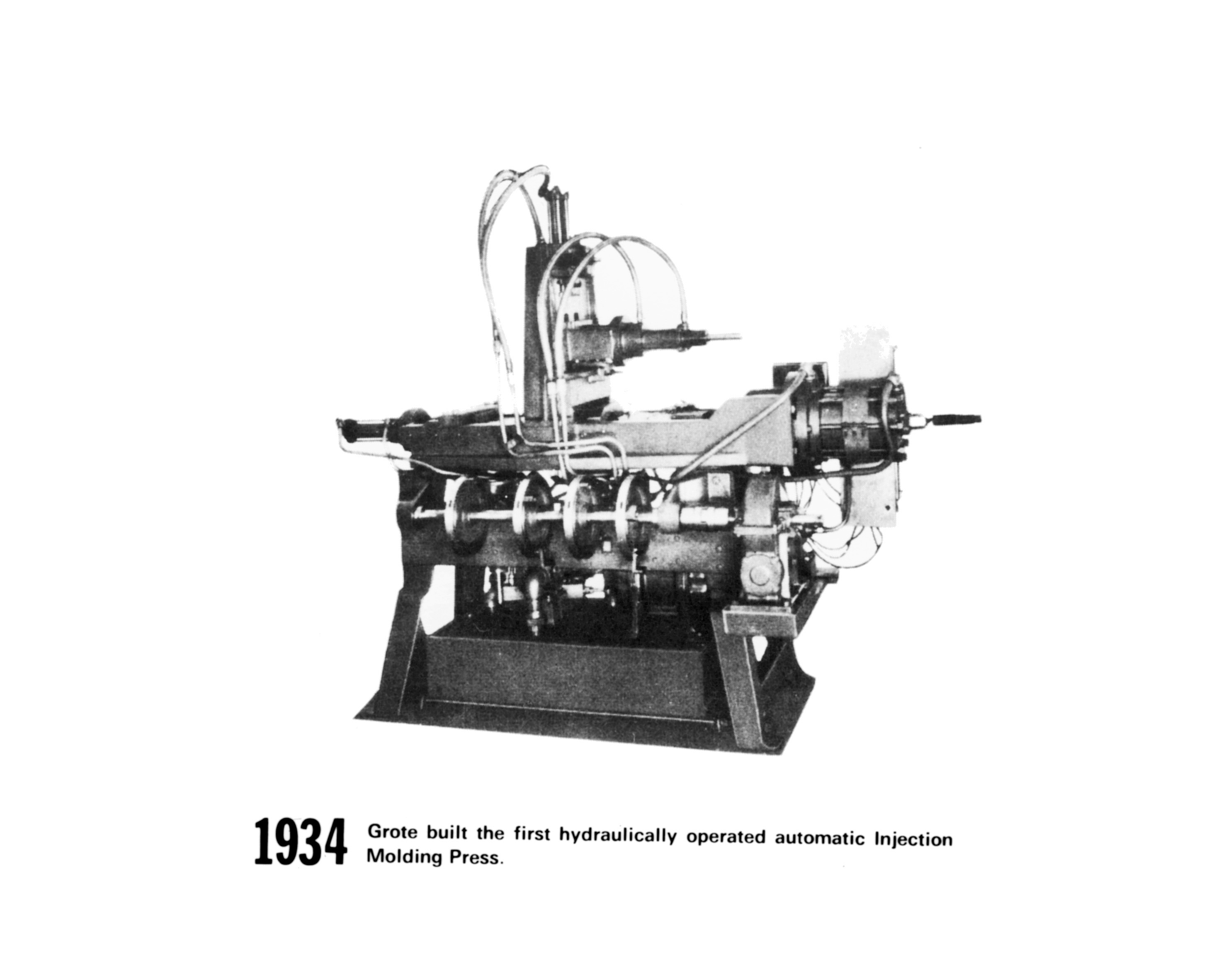 first hydraulically operated automatic injection molding press by grote in 1934