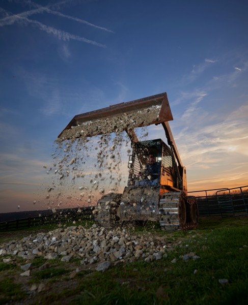 BZ551-5 LED Lights on loader moving rock piles at night BZ551-5 LED Lights on loader moving rock piles at night