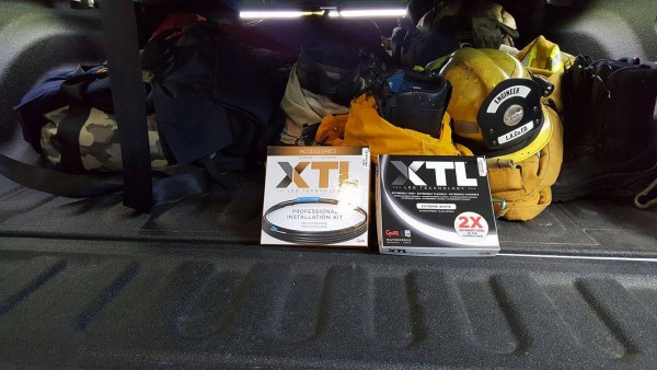 Grote XTL light strip boxes with fireman gear in back of truck Grote XTL light strip boxes with fireman gear in back of truck